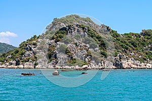 Kekova where sunken shipwrecks of Dolkisthe Antique City which was destroyed by earthquakes in the 2nd century, Tukey