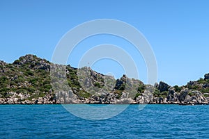 Kekova where sunken shipwrecks of Dolkisthe Antique City which was destroyed by earthquakes in the 2nd century, Tukey