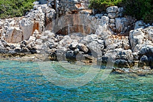 Kekova where sunken shipwrecks of Dolkisthe Antique City which was destroyed by earthquakes in the 2nd century, Tukey