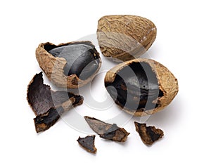 keluak ( pangium seed), used as spice in Indonesian cooking, edible by fermentation.