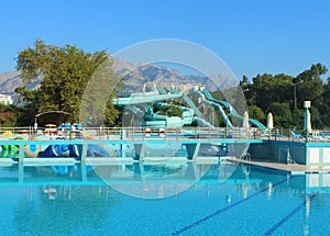 Kemer, Turkey - August 23, 2020: Water park and swimming pool at resort, outdoor aquapark at Daima Biz hotel with water slides.