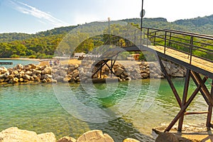 KEMER, TURKEY: View of a small bridge near the canal on the beach in Kemer.