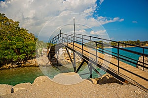 KEMER, TURKEY: View of a small bridge near the canal on the beach in Kemer.