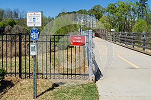 Park closed sign at Cobb County park during mandatory stay at home shelter in place order passed for Covid-19 Corona Virus