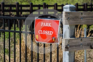 Park closed sign at Cobb County park during mandatory stay at home shelter in place order passed for Covid-19 Corona Virus