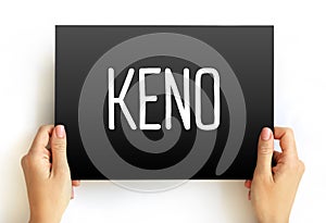 Keno is a lottery-like gambling game often played at modern casinos, text concept on card