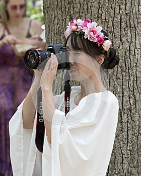 A beautiful girl dressed as a fairy take pictures at the annual Bristol Renaissance Faire