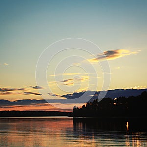 Kenozero lake at sunset. Aged photo. Russian north
