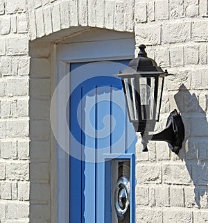 Kent cottage front wooden door street furniture lamp light lighting victorian brickwork windows home house