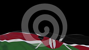 Kenya fabric flag waving on the wind loop. Kenyan embroidery stiched cloth banner swaying on the breeze. Half-filled black