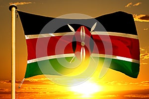 Kenya flag weaving on the beautiful orange sunset with clouds background