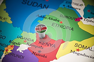 Kenya marked with a flag on the map