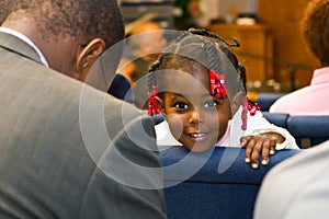 Kenyan American girl in church