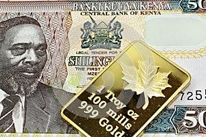 A Kenyan fifty shilling note with a gold bar in macro