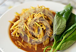 Kerabu mangga, a delicious and famous vegetable appetizer