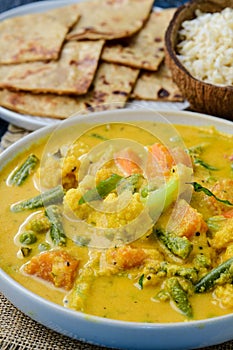 Kerala cuisine- veg korma with parota and rice
