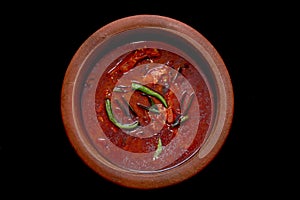 Kerala Fish Curry prepared in Earthernware with Red Chilly Powder