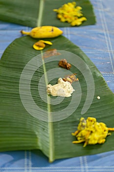 Kerala food laid out on a banana leaf