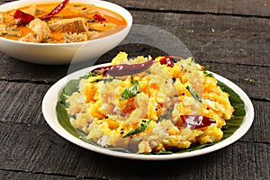 Kerala food Tapioca served with fish curry,