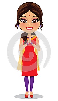 Indian woman wearing a salwar kameez suit in a namaste pose - Vector photo