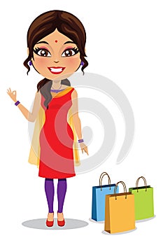 Indian woman wearing a salwar kameez suit with shopping bags - Vector photo