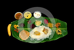 Kerala meals on banana leaf with a lots of curries