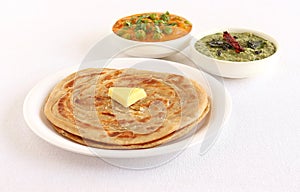 Kerala Paratha with Butter Topping and Side Dishes