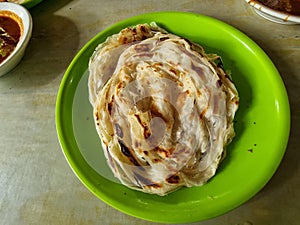 Kerala style parotta or Porotta in a plate.