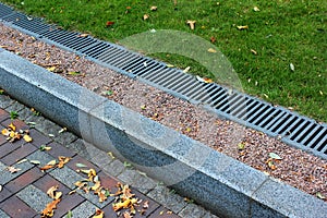Kerbside and rainwater drainage system in a park