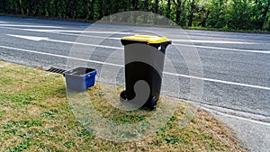 Kerbside recycling bins in Motueka, one for glass the wheelie bin for paper, plastic and metals photo