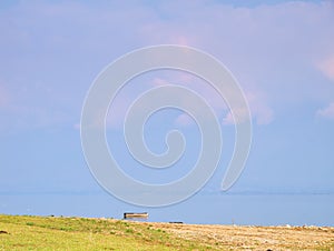 Kerkini lake, Greece, minimalism landscape, one wooden boat on calm water