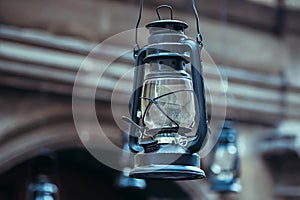 Kerosene lamp hanging on the street