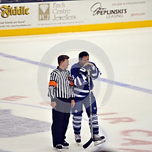 Kerry Fraser with Doug Gilmour