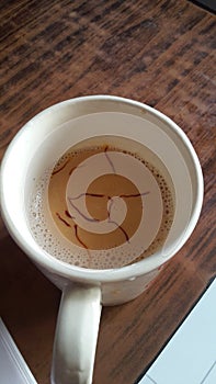 Cup of Kesari milk tea photo