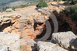 Keshet Cave - ancient natural limestone arch spanning the remains of a shallow cave with sweeping views near Shlomi