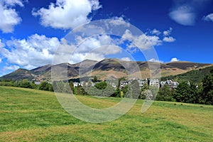 Lake District National Park with Keswick Town below Latrigg Peak, Cumbria, England photo