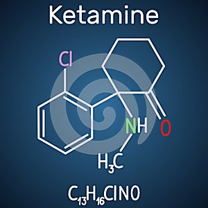 Ketamine molecule. It is used for anesthesia in medicine. Structural chemical formula and molecule model on the dark blue