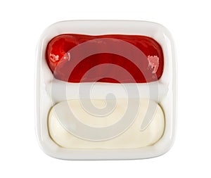 Ketchup and mayonnaise in partitioned sauceboat isolated on white. Top view