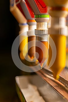 ketchup and mustard dispenser in selective focus