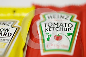 Ketchup and mustard from Heinz brand in sachets