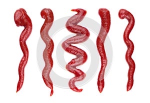 Ketchup splashes, group of objects. Arrangement of red ketchup or tomato sauce, isolated white background, top view