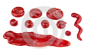 Ketchup splashes, group of objects. Arrangement of red ketchup or tomato sauce, isolated white background, top view