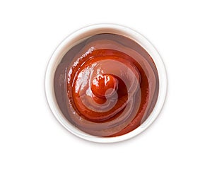 Ketchup or tomato sauce isolated on white background, top view. Isolated on white in perspective. Bowl with ketchup isolated on wh