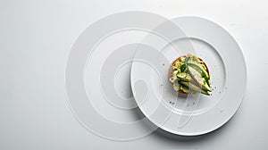 keto bread with avocado, elegantly served on a white plate atop a pristine table against a white wall backdrop