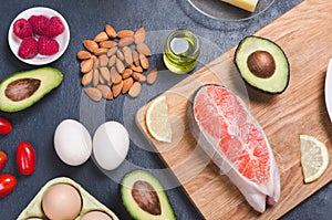 Keto diet, low carb healthy food on black background