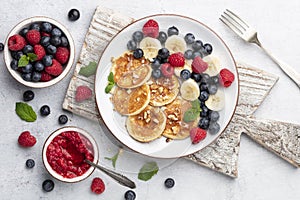 Keto diet pancakes made or almond flour, served with berries