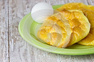 Keto Egg Bread on a wood plank board for ketogenic diet