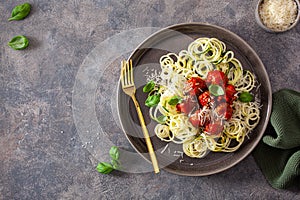 Keto paleo diet zoodles spiralized zucchini noodles with meatballs and parmesan