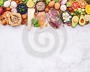 Ketogenic low carbs diet concept. Ingredients for healthy foods selection set up on white concrete background