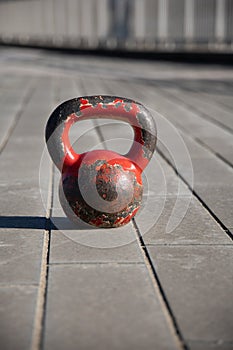 Kettle-bell close up portrait during outdoor training